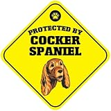 Panneau de croisement en aluminium jaune protégé par un cocker spaniel croix Xing