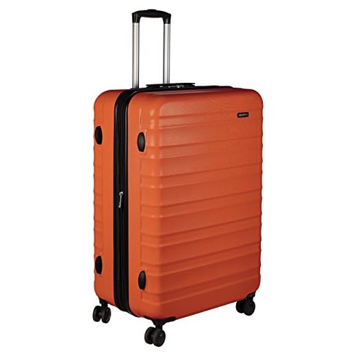 Amazon Basics Valise de voyage à roulettes pivotantes, 78 cm, Orange Brûlée