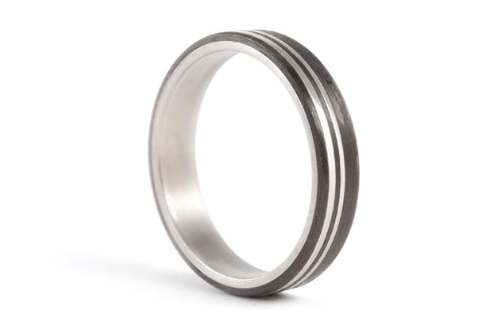 Women's titanium and carbon fiber ring. Unique black matte wedding band. Water