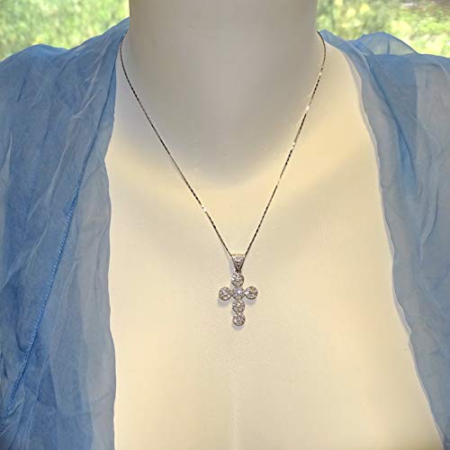 Cruz de Oro Blanco 18k con 63 Diamantes 1.40cts