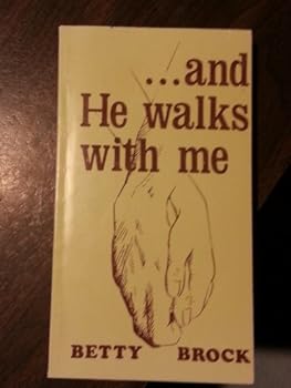 Paperback And He Walks with Me Book