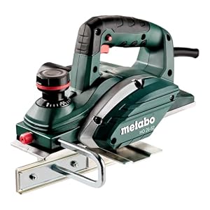 Metabo Hobel HO 26-82 (Hobelbreite 82 mm, Hobeltiefe einstellbar 0-2, 6 mm, Softgrip-Oberfläche, 620 W, mit Staubbeutel + Hobelmesser, weiteres Zubehör) 602682000