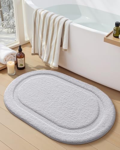 Image of Color&Geometry Oval White Bathroom Rugs 32x20, Extra Soft Absorbent Microfiber Bath Rugs, Non-Slip Bathroom mat, Washable Plush Bath Mats for Bathroom, Shower, Bathtub, Laundry, White