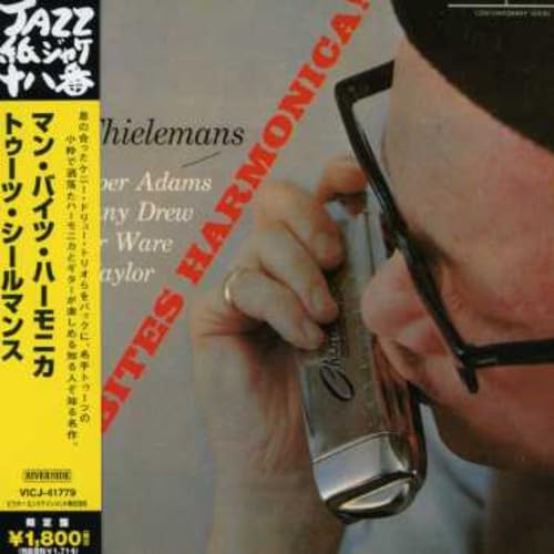 Man Bites Harmonica