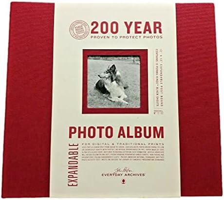 Photo Album. 12" x 12" expandable post-bound. Contains 10 perma-hinge black sheets.