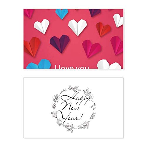 Tarjeta de felicitación hecha de origami con corazón geométrico para un Año Nuevo elegante