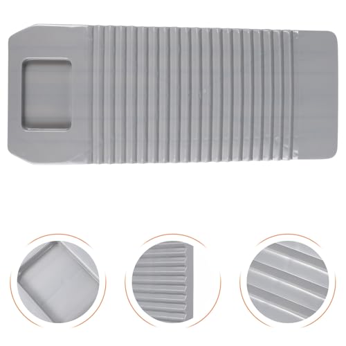 Brosse à linge et planche à laver antique pour enlever les taches