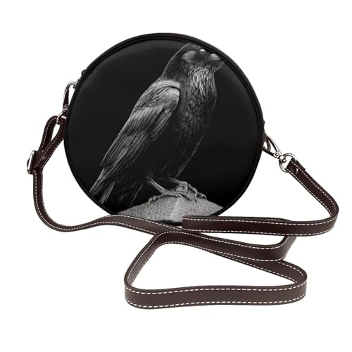 Woshuwo Bolso bandolera redondo de piel para mujer, diseño de cuervo posado en una piedra