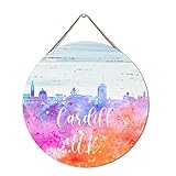 Matériaux : bois. Rond de 30,5 x 30,5 cm. Les motifs de graffiti aquarelle Skyline City Silhouette sont imprimés directement sur le bois. Aucun autocollant n'est utilisé, assurant que votre panneau ne s'écaille pas, ne s'écaille pas et ne se décolore pas.
