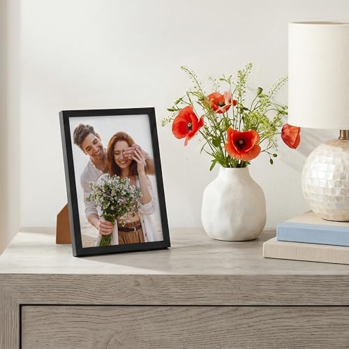 Image of Americanflat 7x10 Picture Frame with Shatter-Resistant Glass - Streamline Collection - Thin Border Photo Frame for Tabletop and Wall Display - Hanging Hardware and Easel Stand Included - Black