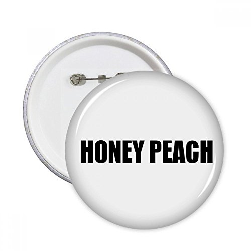 Bouton badge Honey Peach pour masquer un accroc sur un vêtement