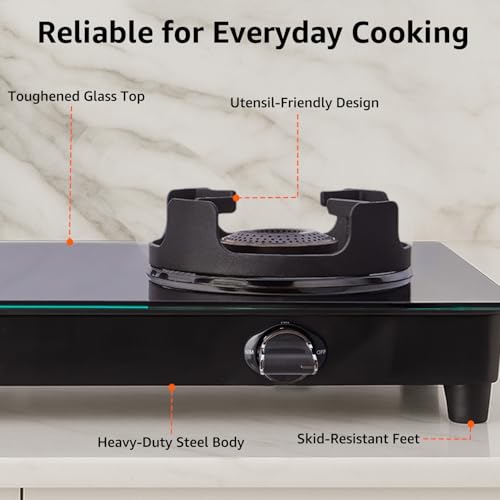 Image of Amazon Basics 2 Burner Glass Top Gas Stove - Auto Ignition, 5G Brass Burners, Crown Pan Supports, ISI Approved, Toughed Glass Top, Anti Skid Legs - Black