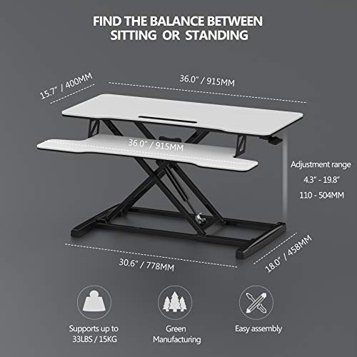 Image of FITUEYES Height Adjustable Standing Desk 36 inch Wide Sit to Stand Converter Stand Up Desk Tabletop Workstation for Laptops Dual Monitor Riser White SD309103WW