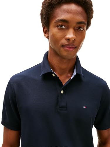 Image of Tommy Hilfiger Men's Short Sleeve Moisture Wicking Stretch Polo Shirt With Quick Dry + Uv Protection