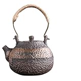 Théière traditionnelle : matériaux calcinés à la flamme selon une technique traditionnelle, donnant naissance à des martelages aux motifs changeants, pour des théières uniques