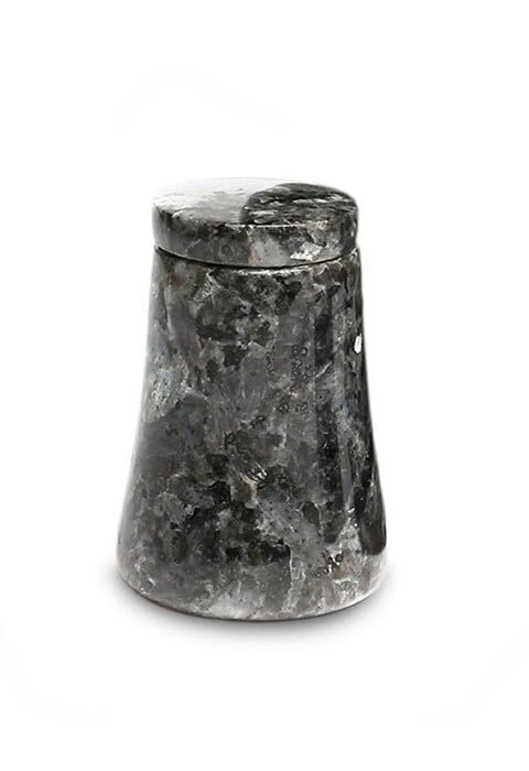 Petite urne funéraire en granit pot pour créer un espace de recueillement à la maison