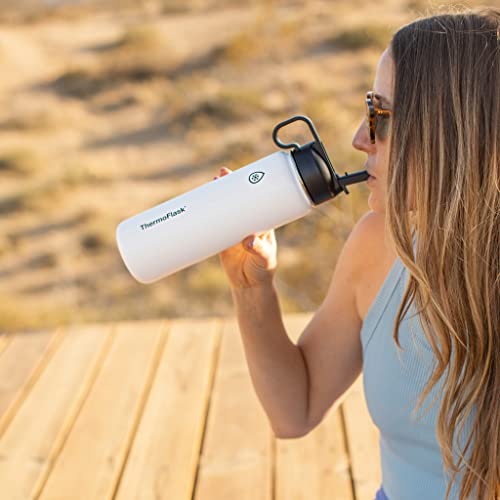 Image of ThermoFlask 24 oz Double Wall Vacuum Insulated Stainless Steel Water Bottle - Reusable with Leakproof Chug & Straw Lids - Keeps Drinks Cold 24 hr /Hot 12 hr - Easy Maintenance - Gym /On-the-Go, White