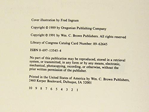 The Newspaper Designer's Handbook 0697135454 Book Cover