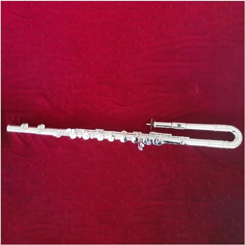 Instrument muzyczny z fletem basowym z korpusem z białej miedzi i srebrnymi klawiszami, zawiera futerał na flet