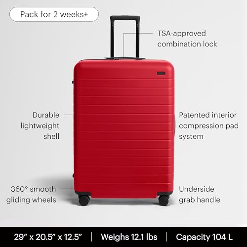 Image of Away Large Checked Luggage - 29-Inch Lightweight Hardside Suitcase with Four WhisperGlide 360 Spinner Wheels, Interior Compression System, TSA-Accepted Lock - Cherry Red
