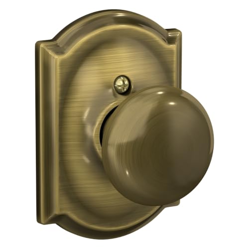 SCHLAGE Plymouth Non-Turning Dummy Door Knob, Camelot Trim, Antique Brass - image 1