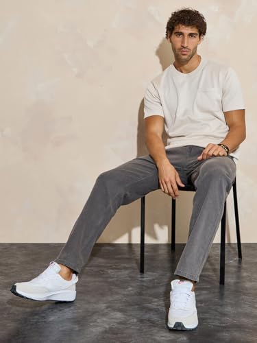 Image of Styli Men Solid Balloon Fit Jeans | Stretchable & Comfort, Mid-Rise Casual Denim Pants for Everyday Wear |Machine Washable