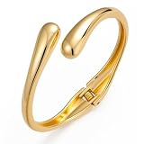 Inspiración del Diseño: Con una forma minimalista de lágrima fina, los brazaletes de oro presentan líneas suaves y llenas como lágrimas, creando una gran pieza de joyería que es a la vez elegante y con estilo.El uso de este brazalete de oro delicado y brillante refleja su temperamento de lujo discreto y realza su encanto y gusto en general.