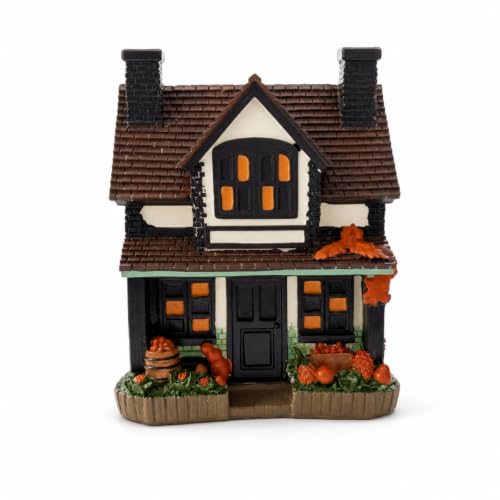 Casa de calabaza de otoño rústica con luz decorativa tenue 2