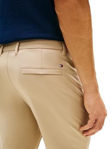 Image of Tommy Hilfiger Men's Casual Moisture Wicking Wrinkle Resistant Stretch Performance Pants in Straight Fit