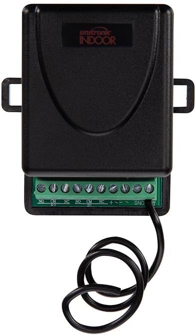 Close-up of the Unitronic receiver module, showing the green terminal block with labeled connections: NO, CM, NC, +, -, GND, D1.