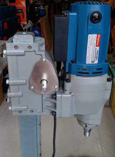 Close-up view of the Dong Cheng DZZ02 drill motor and gearbox assembly.