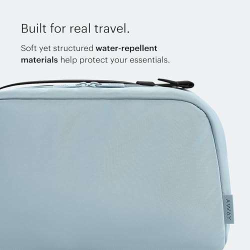 Image of Away Amazon Exclusive Large Toiletry Bag - Water-Repellent Travel Toiletry Bag with Clamshell Opening, Interior Compartments, Exterior Zip Pocket - Sky Blue