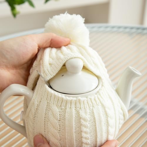 Image of One-Piece Cable Knit Teapot Cozy with Pom Pom Top, Acrylic Insulated Tea Pot Cover with 2 Button Fasteners & Lid Opening, British Style Hot Cold Insulator for 2 Cup 15-20oz Teapots,white