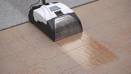 Carpet shampooer system in use on carpet floor