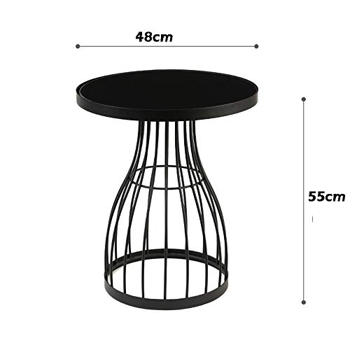 Table d'angle en fer forgé noir pour optimiser les petits salons