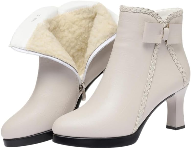 Lady's pointed-toe, thick-soled, bow-shaped ankle boots, made of fashionable leather material. There is a zipper design on the side and the interior is lined with fur for warmth and comfort.