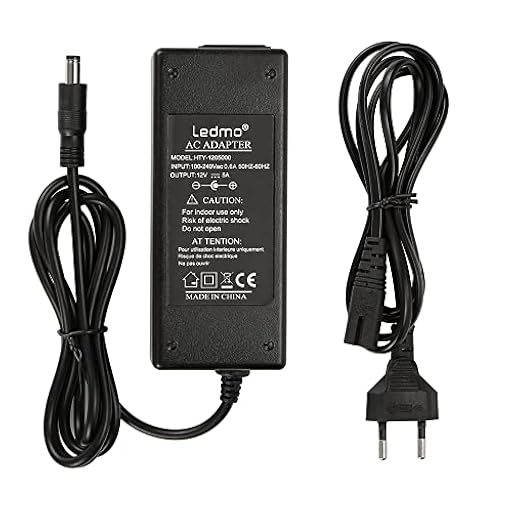 LEDMO Transformador 12V 5A/6A Adaptador de Corriente 60W/70W Fuente de Alimentación Transformador Voltaje de Entrada CA 100-240V a CC 12V | Ya disponible en tu tienda friki favorita! En mundofriki.es! LEDMO Transformador 12V 5A/6A Adaptador de Corriente 60W/70W Fuente de Alimentación Transformador Voltaje de Entrada CA 100-240V a CC 12V | Ya disponible en tu tienda friki favorita! En mundofriki.es!