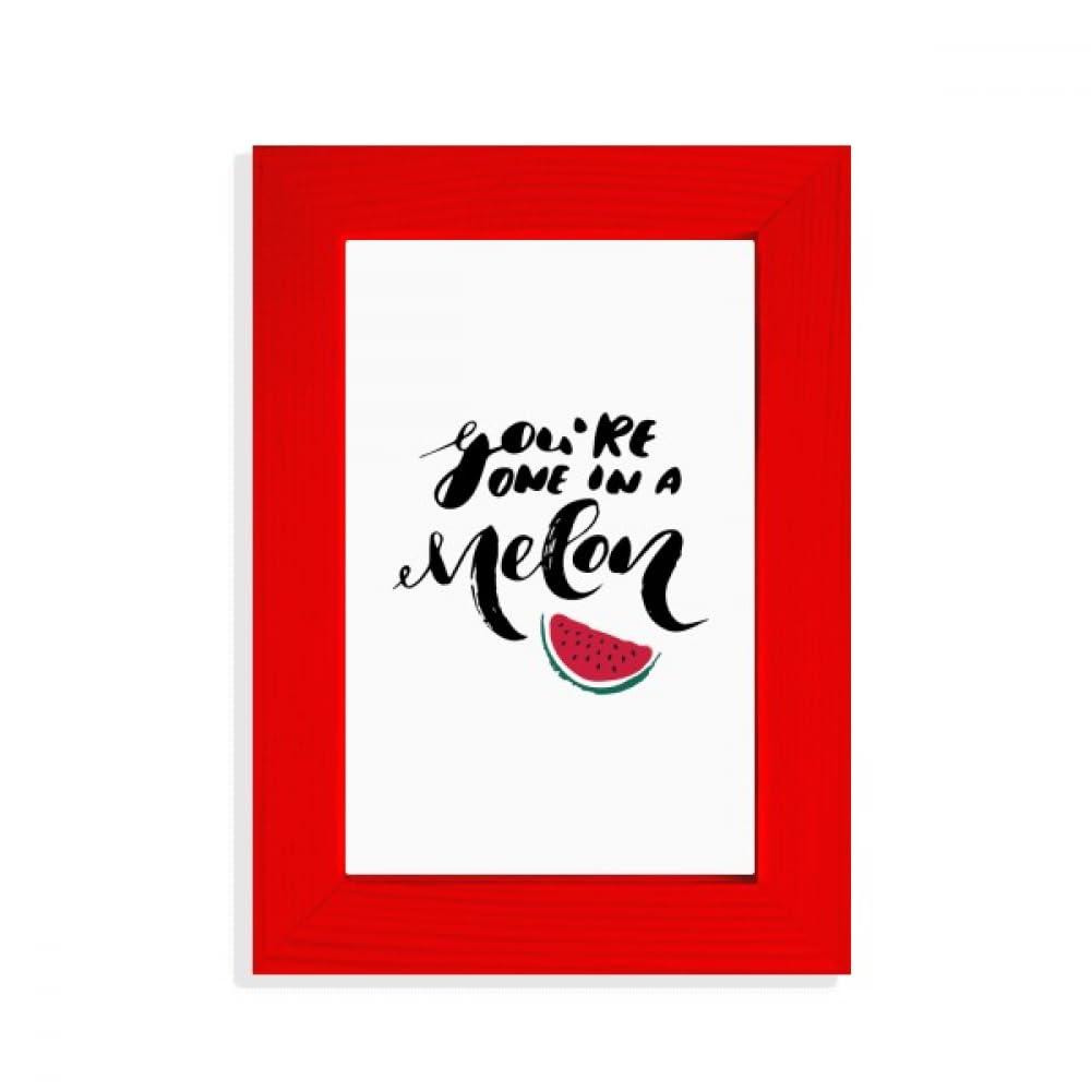 Cadre photo rouge You are in a melon pour égayer un mur blanc terne