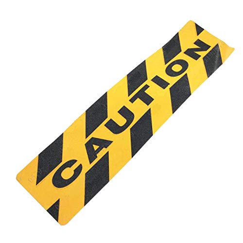 Marquage au sol jaune et noir pour sécuriser les escaliers de la maison et de l'atelier