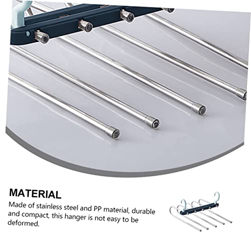 Cintre à pantalons extensible en acier bleu pour optimiser le dressing