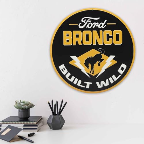 Image of Ford Bronco Built Wild Embossed Metal Sign - Fun Ford Bronco Wall Decor for Man Cave or Garage
