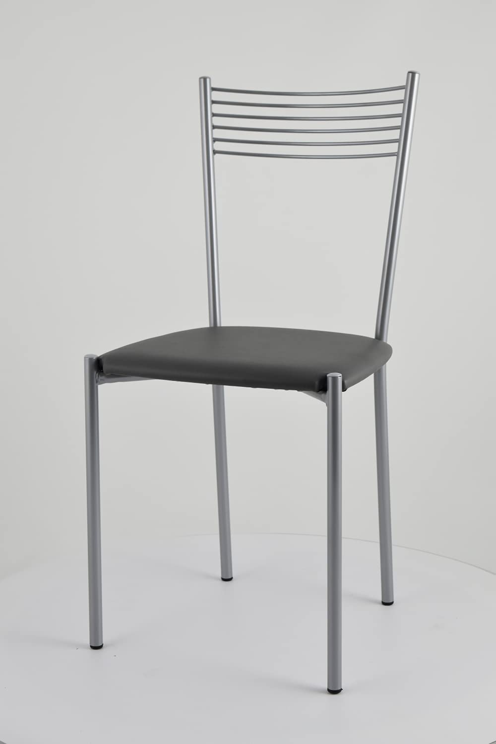 t m c s Tommychairs - Set 4 sillas Elegance para Cocina, Comedor, Bar y Restaurante, Estructura en Acero Pintado de Color Aluminio y Asiento tapizado en Polipiel Color Gris Oscuro