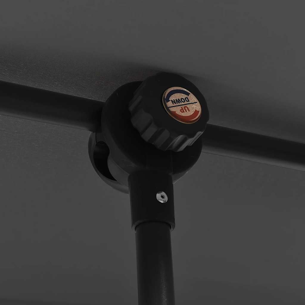Close-up of the manual adjustment knob on the parasol pole, used for height and tilt adjustments.