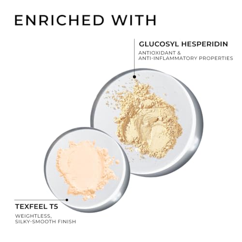 A woman applying the lightweight skin tint for a natural glow.