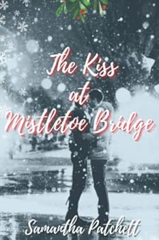 Paperback The Kiss at Mistletoe Bridge Book