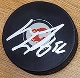 Autographed MacKenzie Weegar Calgary Flames Hockey Puck