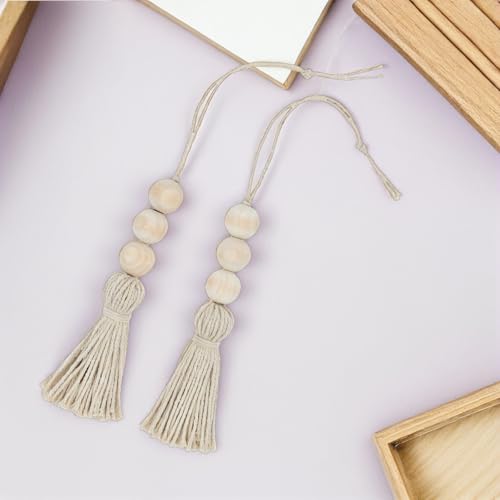 Cuentas de madera con borlas boho para decorar las puertas de casa 7