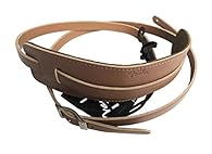 Fender's Super Deluxe Strap in black or natural boasts all the features of the original Standard Vintage model A classic look and feel with striking added appointments Adjustable length (42”-55”) provides a versatile fit for most players. Natural bel...