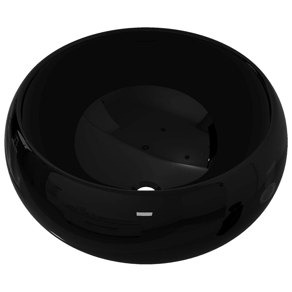 Lavabo redondo negro para inodoro de invitados moderno y elegante