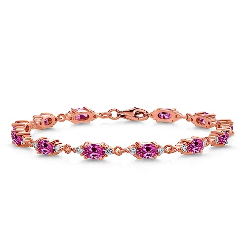 Gem Stone King 18K Rose Gold Plated Silver Pink Created Sapphire and White Moissanite Tennis Bracelet For Women (6.91 Cttw, Gemstone Birthstone, Oval 6X4MM, 7 Inch)